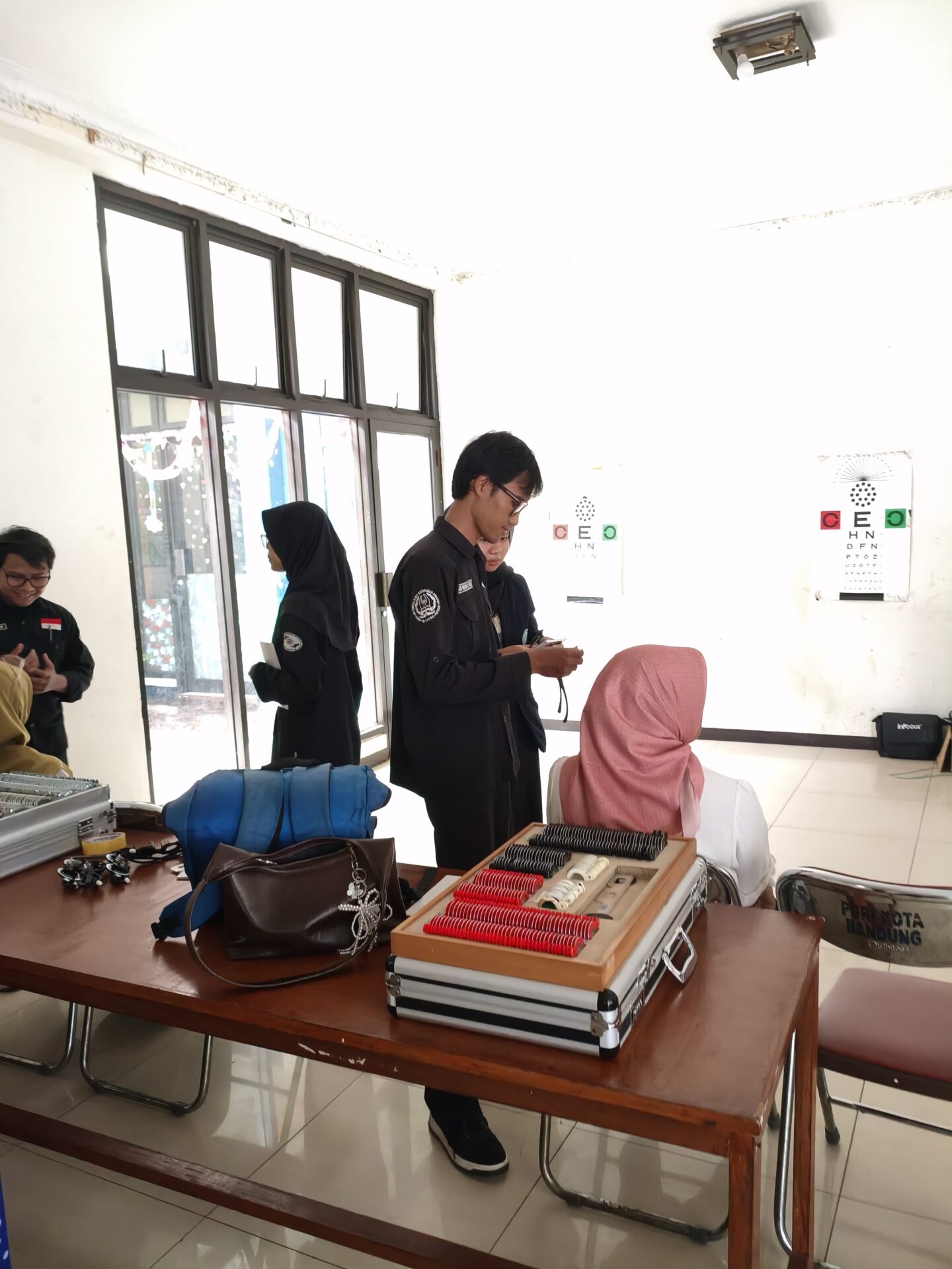 IMG 20260304 WA0027 KEGIATAN TIMKES  STIKes DHARMA HUSADA DI BULAN SUCI RAMADHAN 1447 H. TAHUN 2026,  BERUPA PEMERIKSAAN GCU DAN PEMERIKSAAN MATA  KEPADA JAJARAN PENGURUS DAN ANGGOTA PGRI KOTA BANDUNG. STIKes