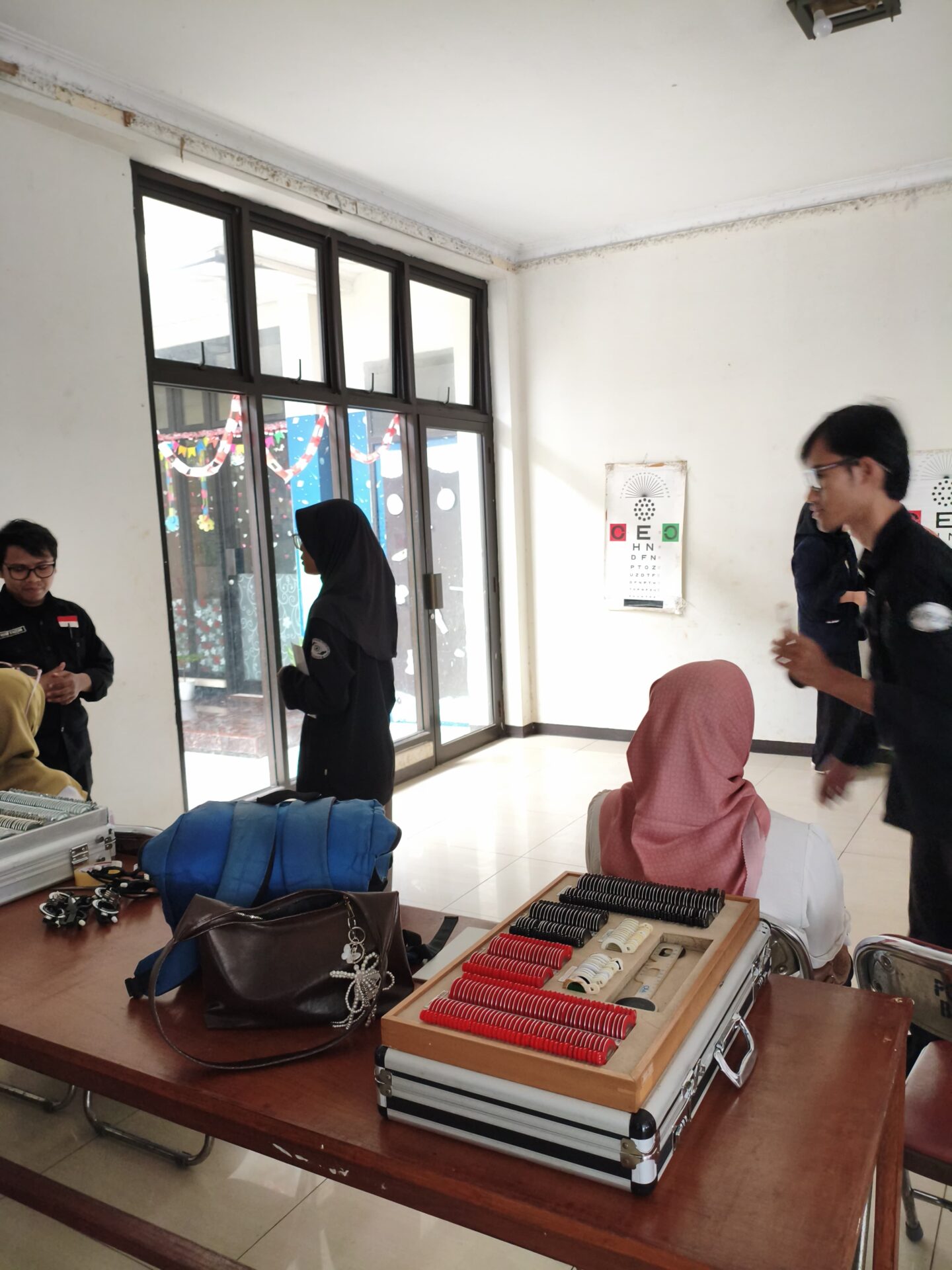 IMG 20260304 WA0029 KEGIATAN TIMKES  STIKes DHARMA HUSADA DI BULAN SUCI RAMADHAN 1447 H. TAHUN 2026,  BERUPA PEMERIKSAAN GCU DAN PEMERIKSAAN MATA  KEPADA JAJARAN PENGURUS DAN ANGGOTA PGRI KOTA BANDUNG. STIKes